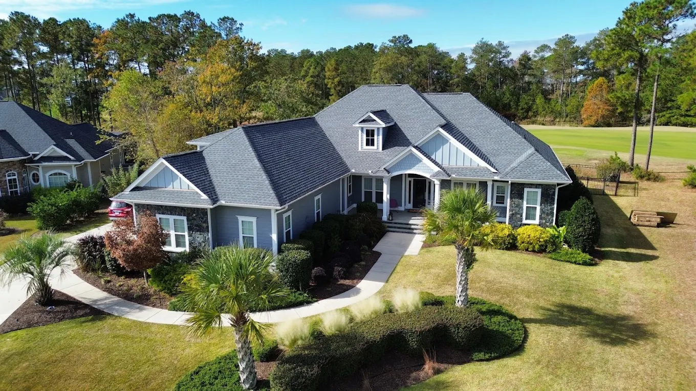 Completed shingle roof replacement on a home in Leland, NC by Roof Methods